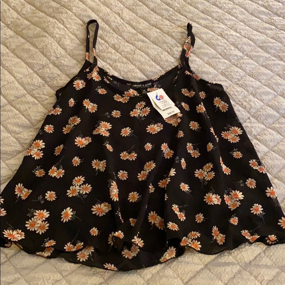 Juniors sunflower print top